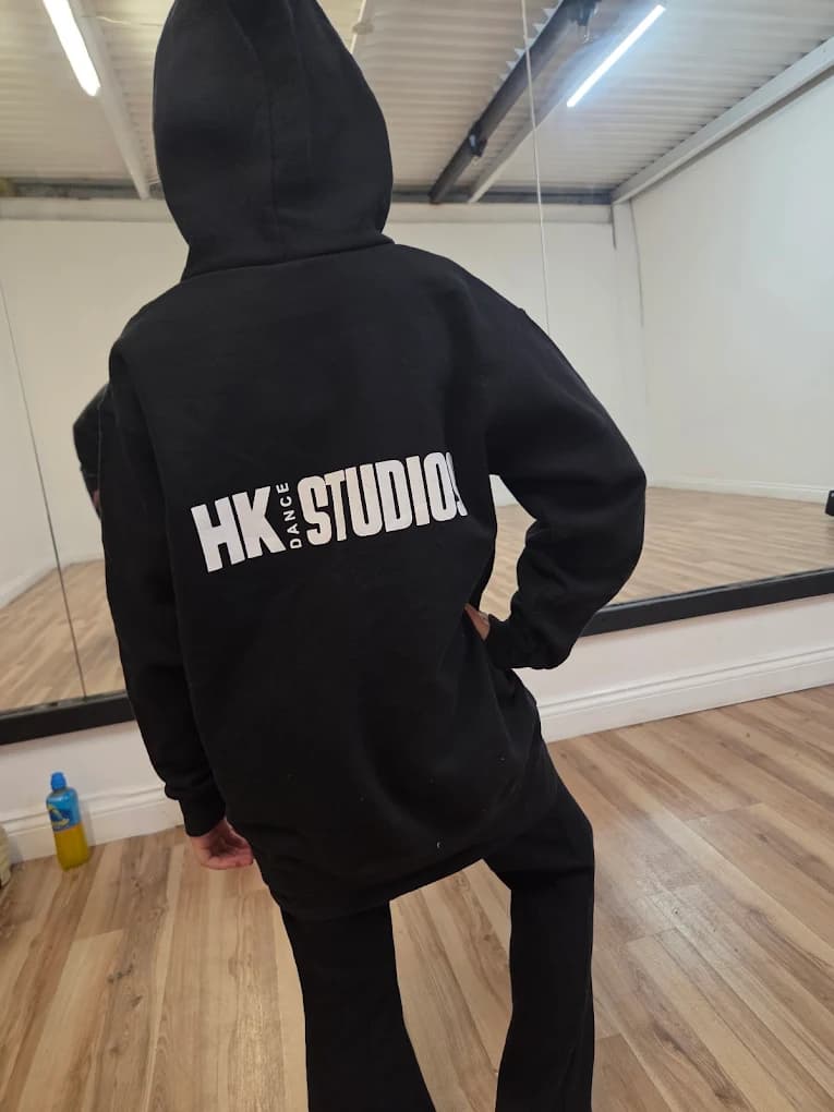HK Studios crew tracksuit logo on dancer's back